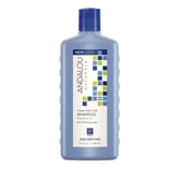 Bottle of Andalou Naturals shampoo with argan stem cells and biotin