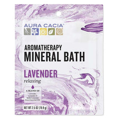 Spa setting with Aura Cacia Aromatherapy Mineral Bath and calming candles