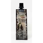 Xcalibur Honey 11000 pack displayed next to natural honeycomb.