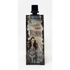 Xcalibur Honey 11000 pack displayed next to natural honeycomb.