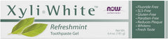 XyliWhite toothpaste ingredients panel with xylitol papain peppermint and spearmint oils