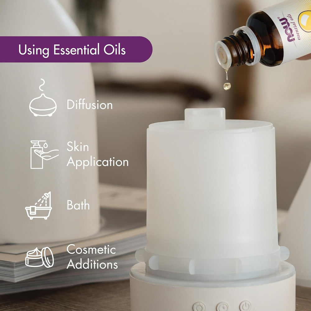 NOW Lavender essential oil label with Lavandula angustifolia and purple flowers