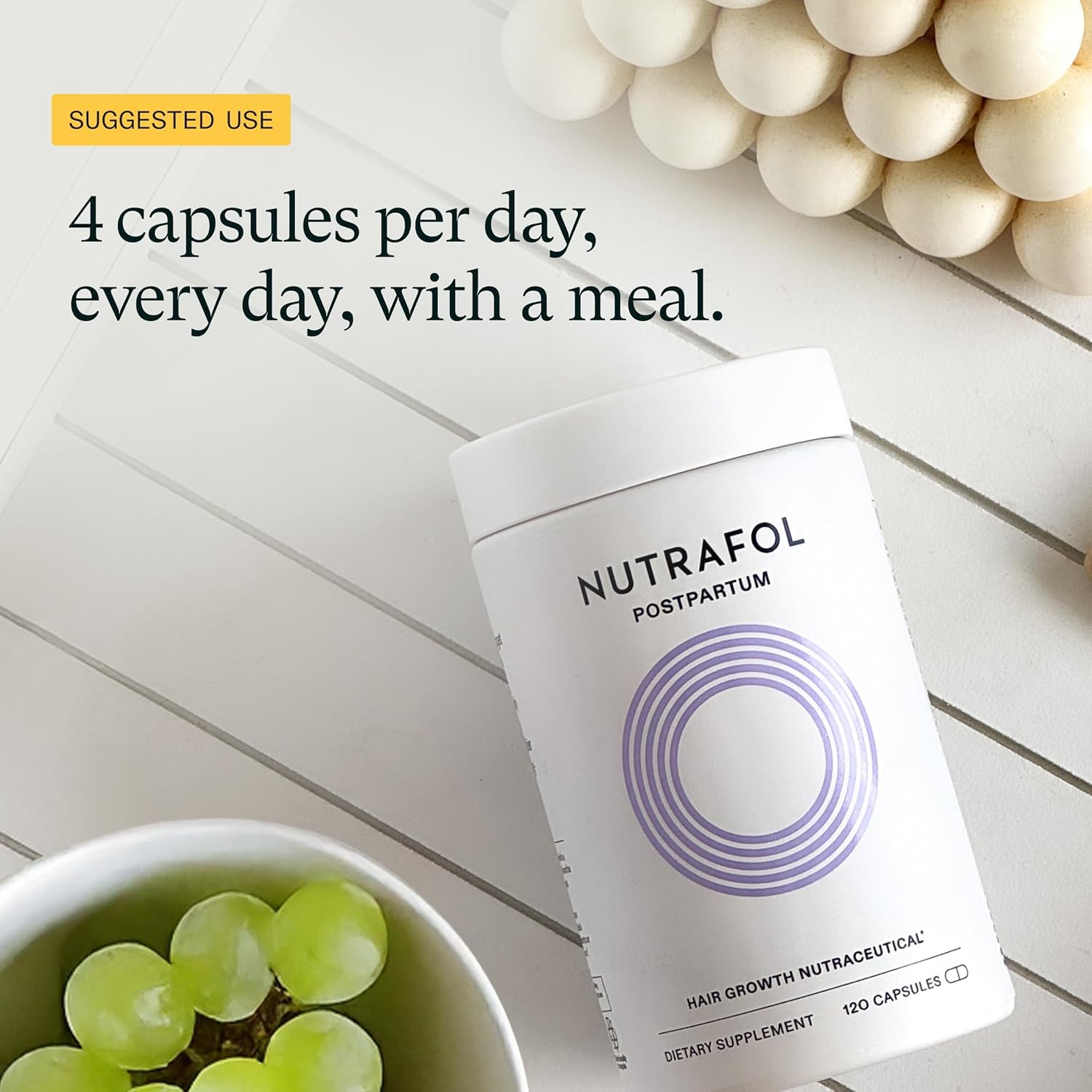 Nutrafol Postpartum hair wellness capsules with breastfeeding-friendly ingredients