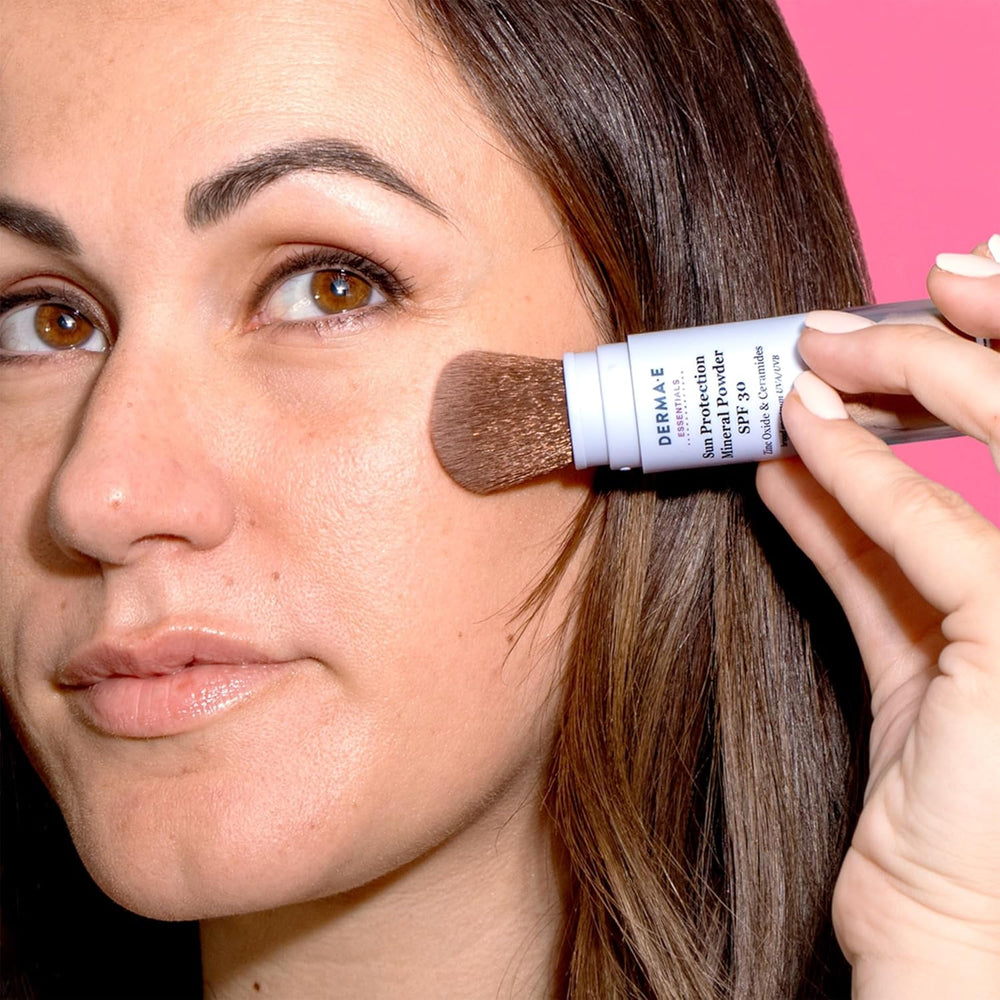 Portable DERMA E SPF 30 mineral powder for lightweight daily UV defense