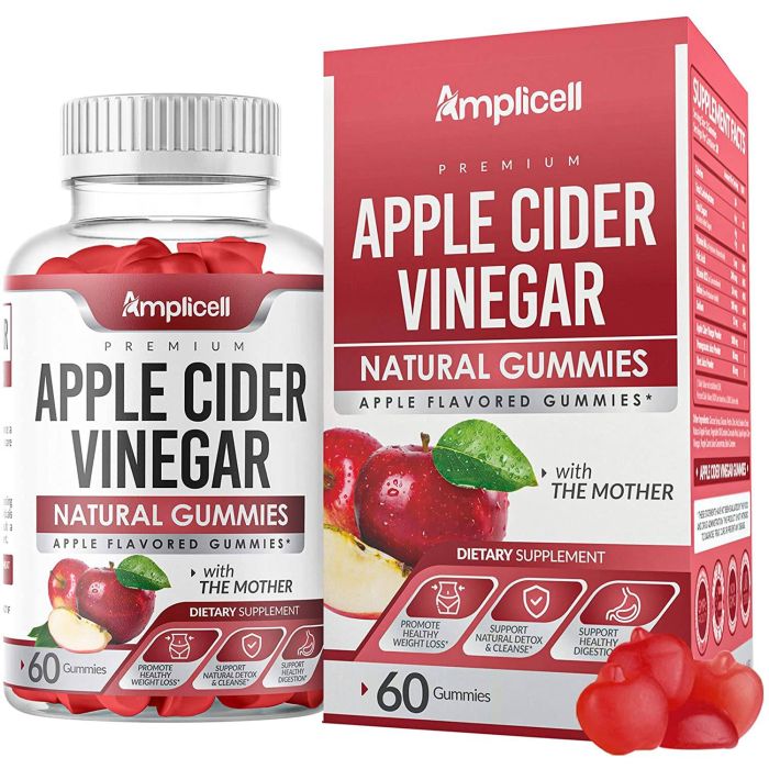 Hand holding Amplicell Apple Cider Vinegar Gummy for daily detox