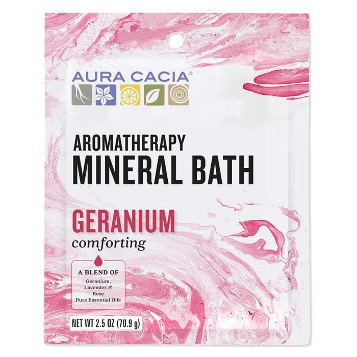 Spa setting with Aura Cacia Aromatherapy Mineral Bath and calming candles