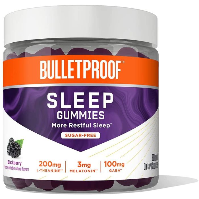 Close‑up of three blackberry-flavored sleep gummies