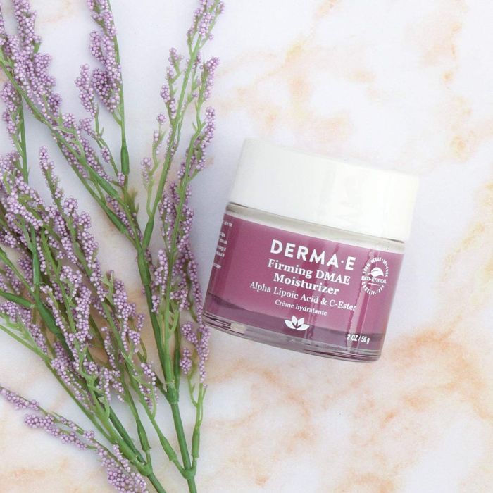 "Open container of Derma Ultra Lift DMAE Moisturizer showing creamy texture for daily skin hydration and firming"