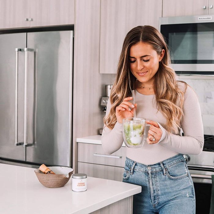 Genius Matcha Powder jar with label showing ingredients and benefits