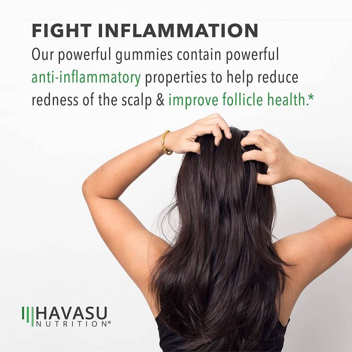 "Close-up of red raspberry-flavored Havasu Saw Palmetto Gummies arranged on table"