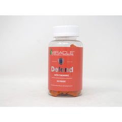 "Back of Miracle Turmeric Gummies showing suggested use and safety warnings"