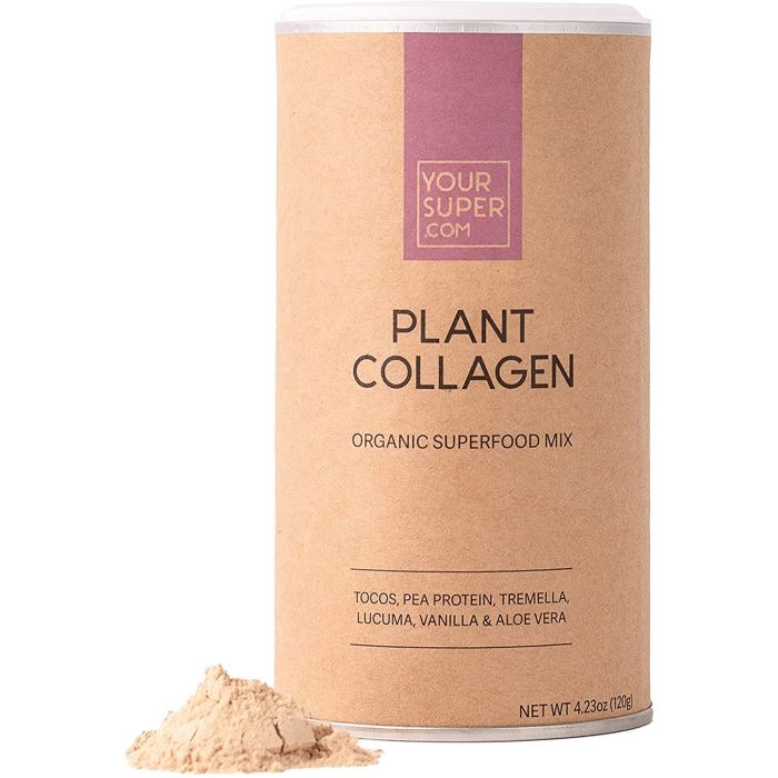 Beauty support powder next to fresh fruits and greens